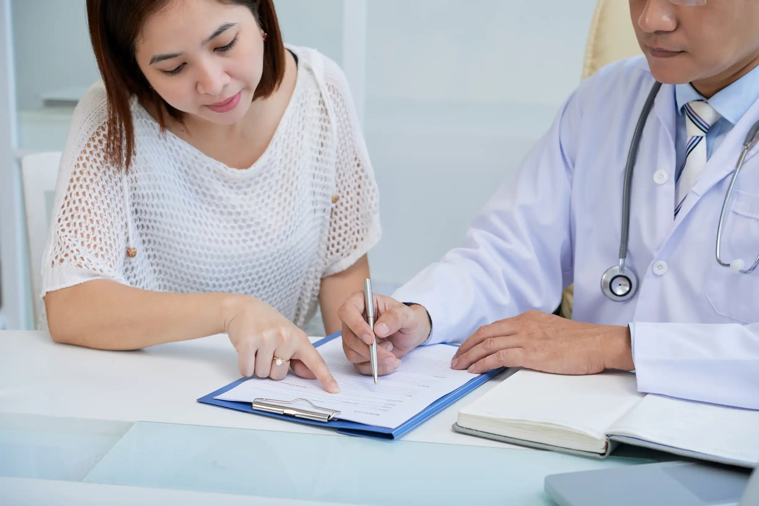 doctor explains patient